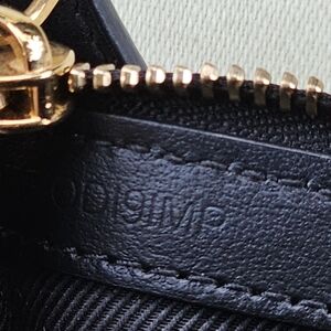 Burberry Black and Gold Leather Detail Excellent Used Conditions